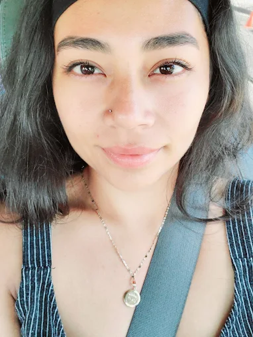 Client photo showing natural, well-shaped brows
